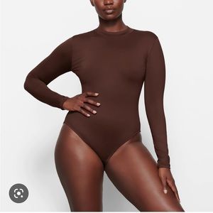SKIMS SWIM LONG SLEEVE ONE PIECE with back zipper. Color cocoa, M